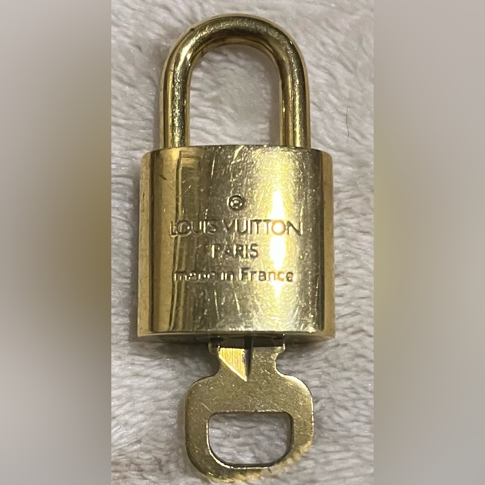 Louis Vuitton padlock and key